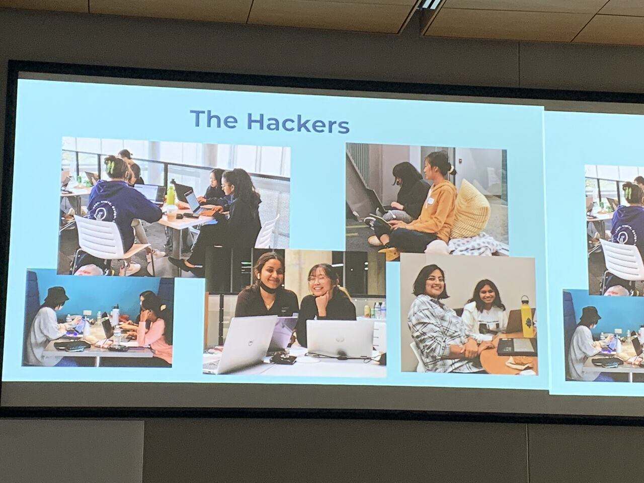 Hackathon presentation showing the team collaborating and working