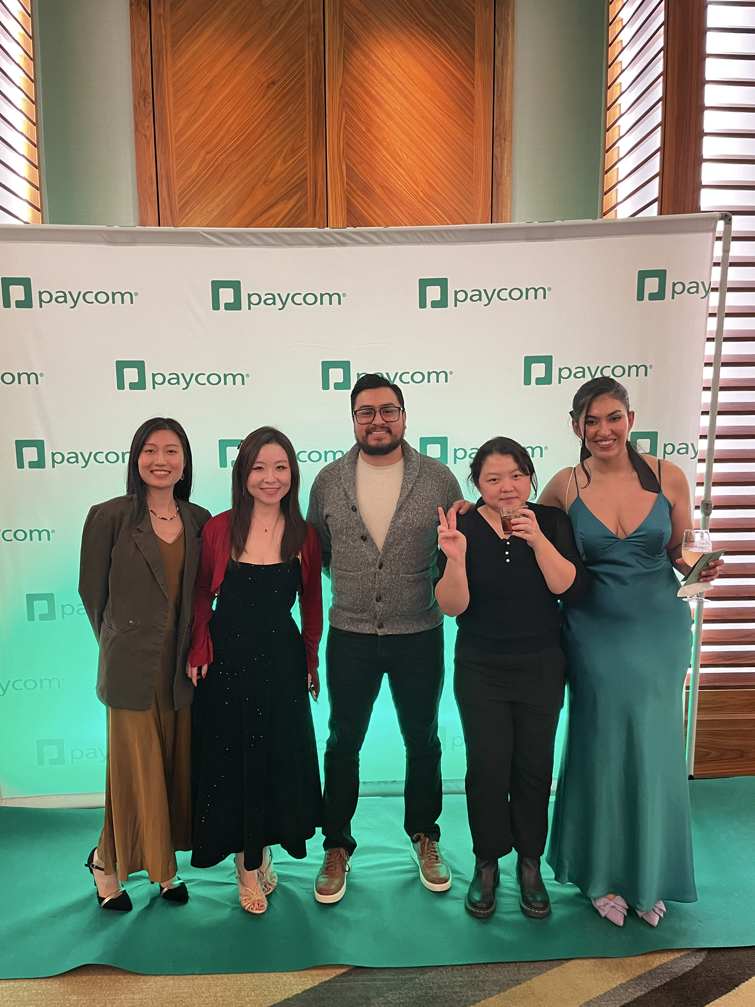 Keyan and colleagues at a Paycom team event