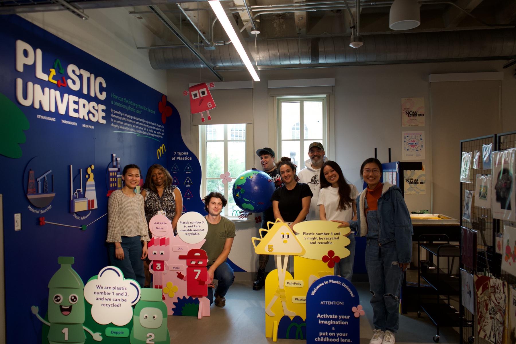 Keyan and collaborators with the Plastic Universe installation