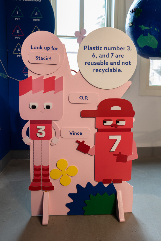 Red Vince and O.P. character panel with a speech bubble introducing their plastic numbers